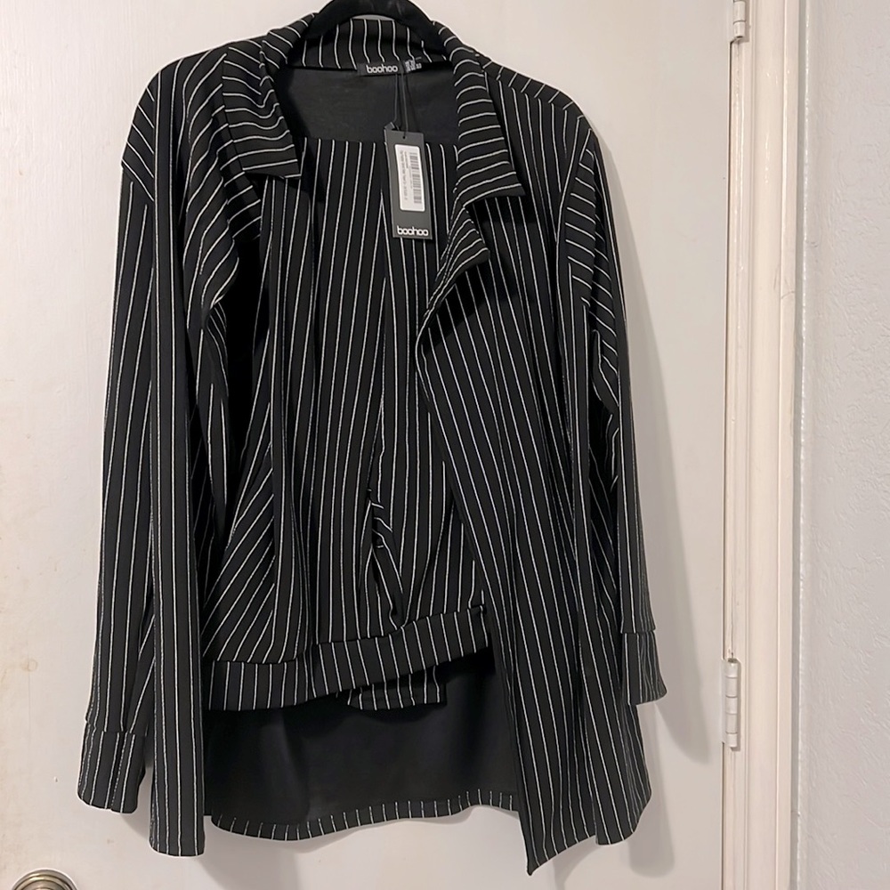 Pinstripe pantsuit, size 16. Never been worn and tags still attached